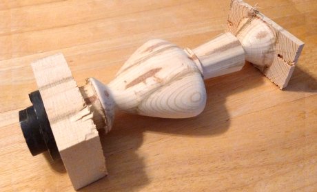 Bottle model, mached from a rectangular block of wood