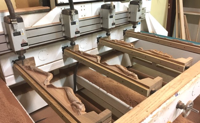 Weihong machine with 4 heads that is rotary machining.